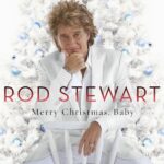 The program mixes standards, duets, orchestral pop, and one original, presenting familiar seasonal material with the polished scale of Stewart’s Great American Songbook recordings.