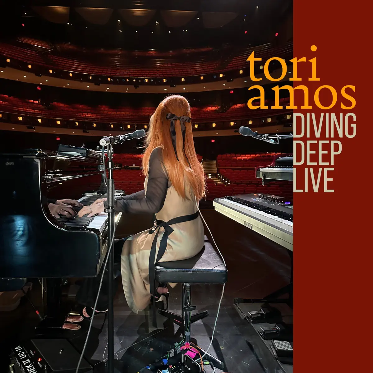 captures Tori Amos during the 2022–23 Ocean to Ocean tour, backed by bassist Jon Evans and drummer Ash Soan. Rather than assemble obvious hits